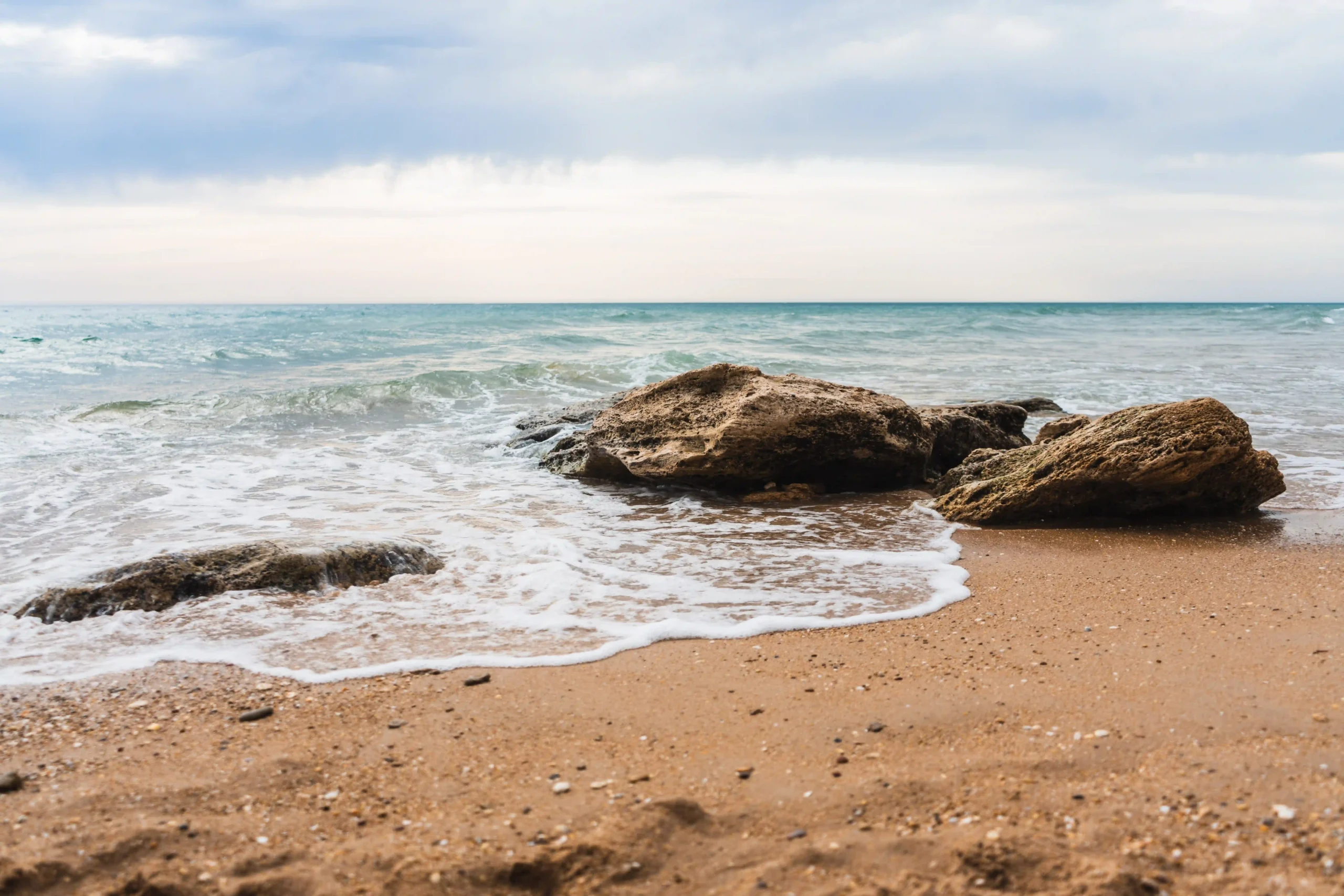 beautiful-shot-waves-sandy-beach