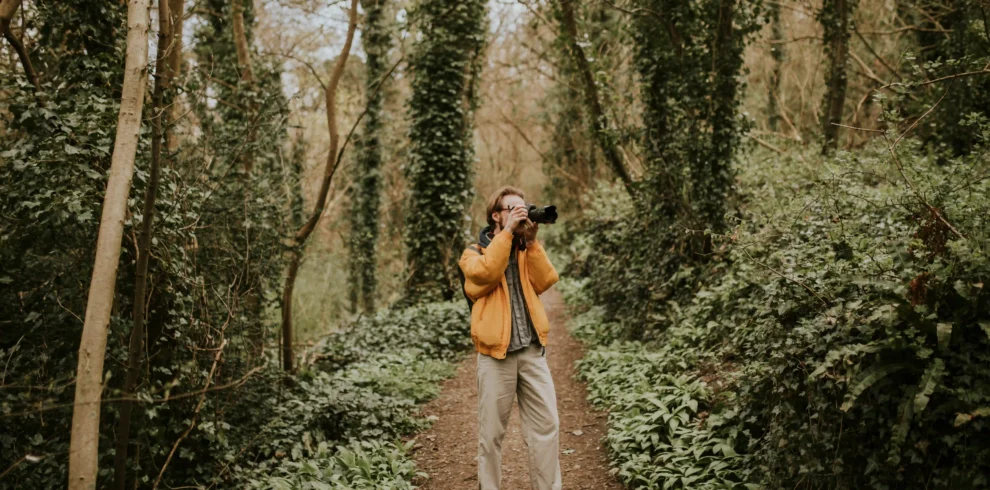 photographer-taking-photos-woods-outdoor