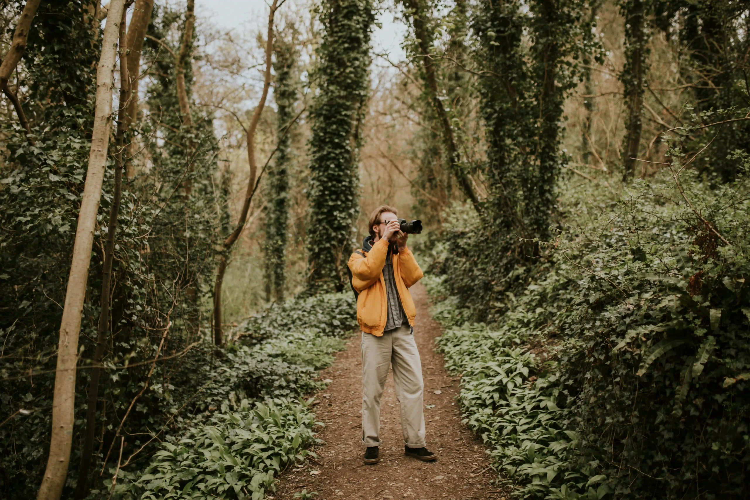 photographer-taking-photos-woods-outdoor